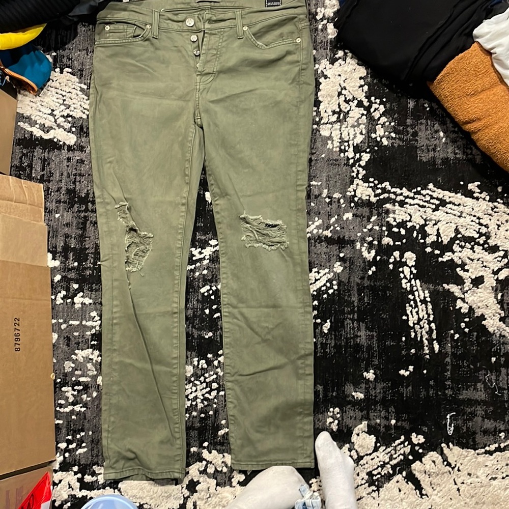Green ripped jeans